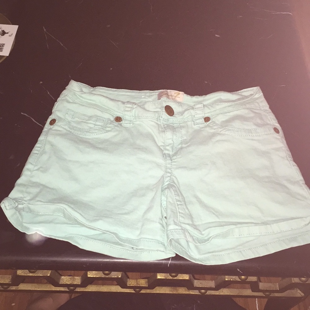Light blue Seven7 Blue Jean shorts.